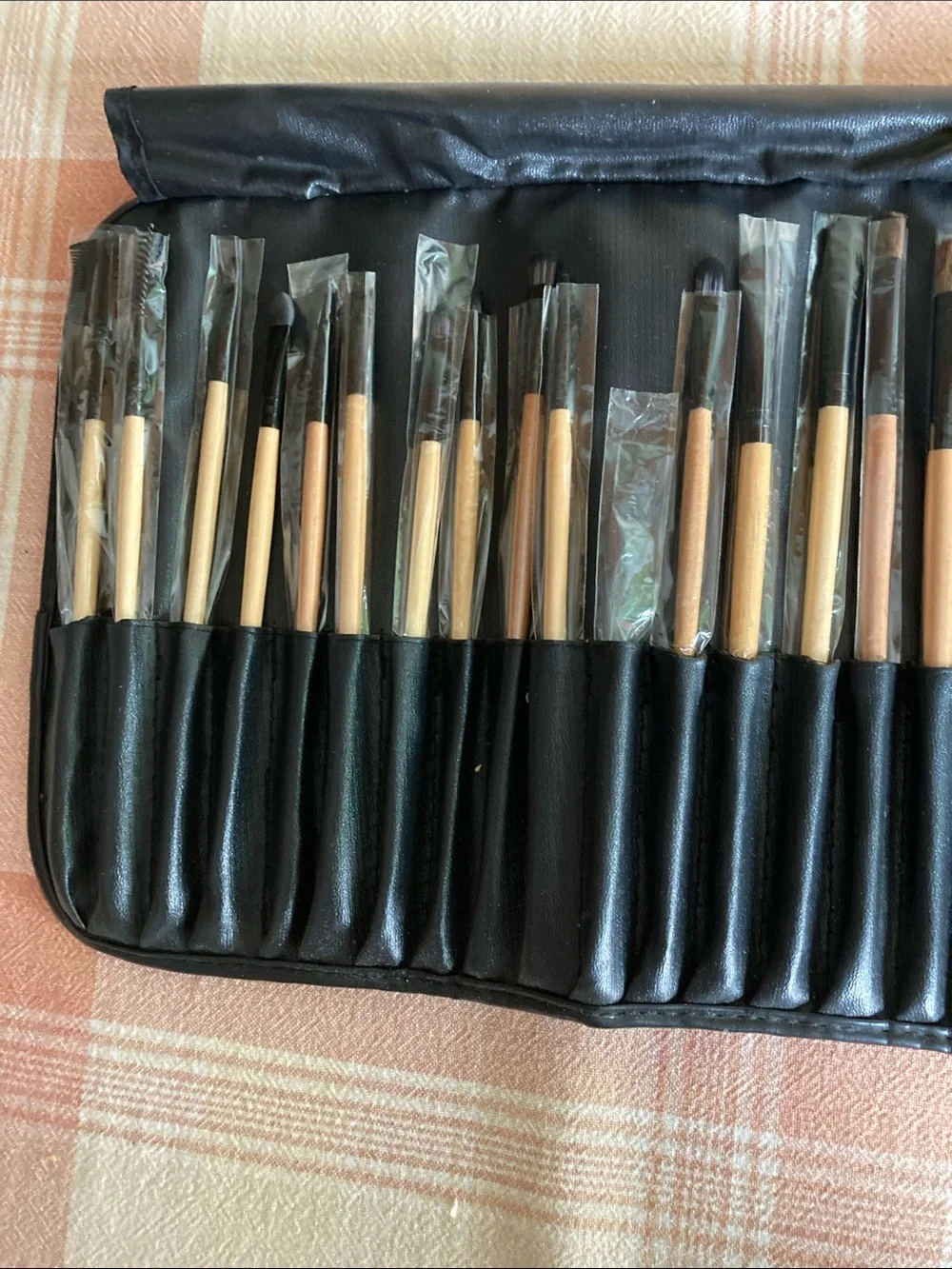 Black Roll-Up Makeup Brush Holder with 24 brushes